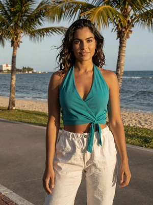 Sofía, 26, Colombian single from Santa Marta in teal top at seaside promenade - verified dating profile