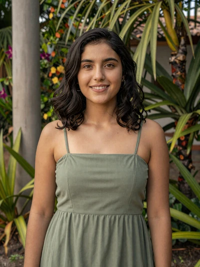 Liz, 23, Paraguayan single from Ciudad del Este in sage green sundress at tropical garden - verified dating profile