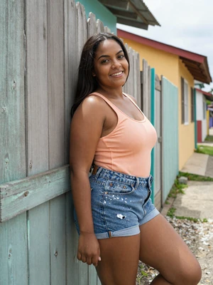 Crystal, 27, Vincentian single from Layou with long dark hair at a colorful village - verified dating profile